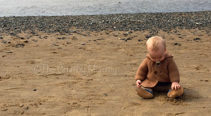 baby boy on the beach