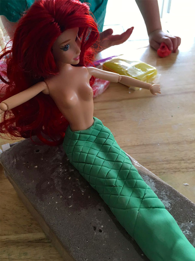 making a little mermaid cake topper