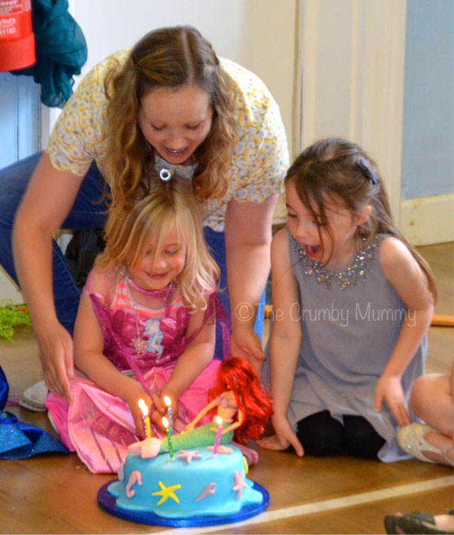 singing happy birthday with candles